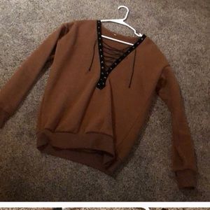 Criss cross tied sweater